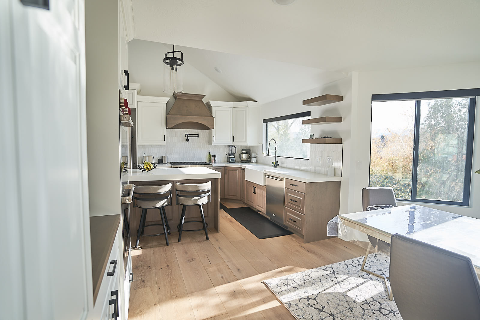 South Jordan project: Wide view of the remodeled kitchen and dining area (Photo 10/29)
