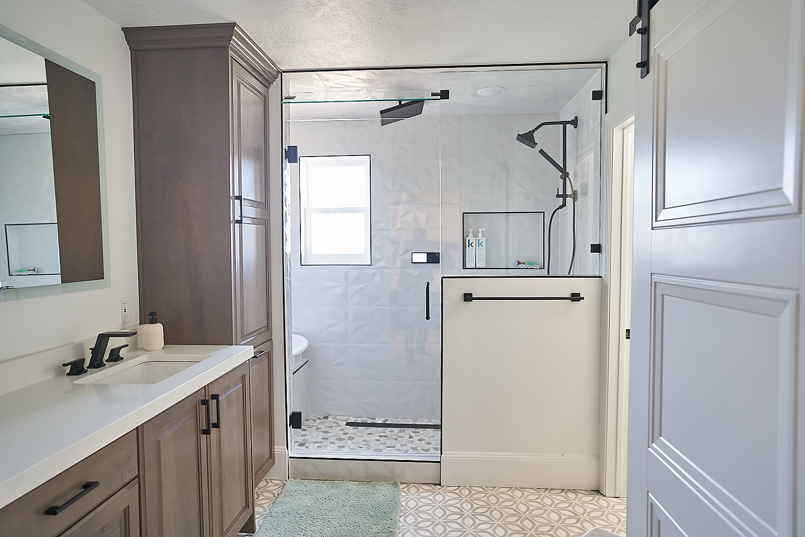 South Jordan project: Contemporary bathroom with glass-enclosed shower and wood-look double vanity (Photo 18/29)