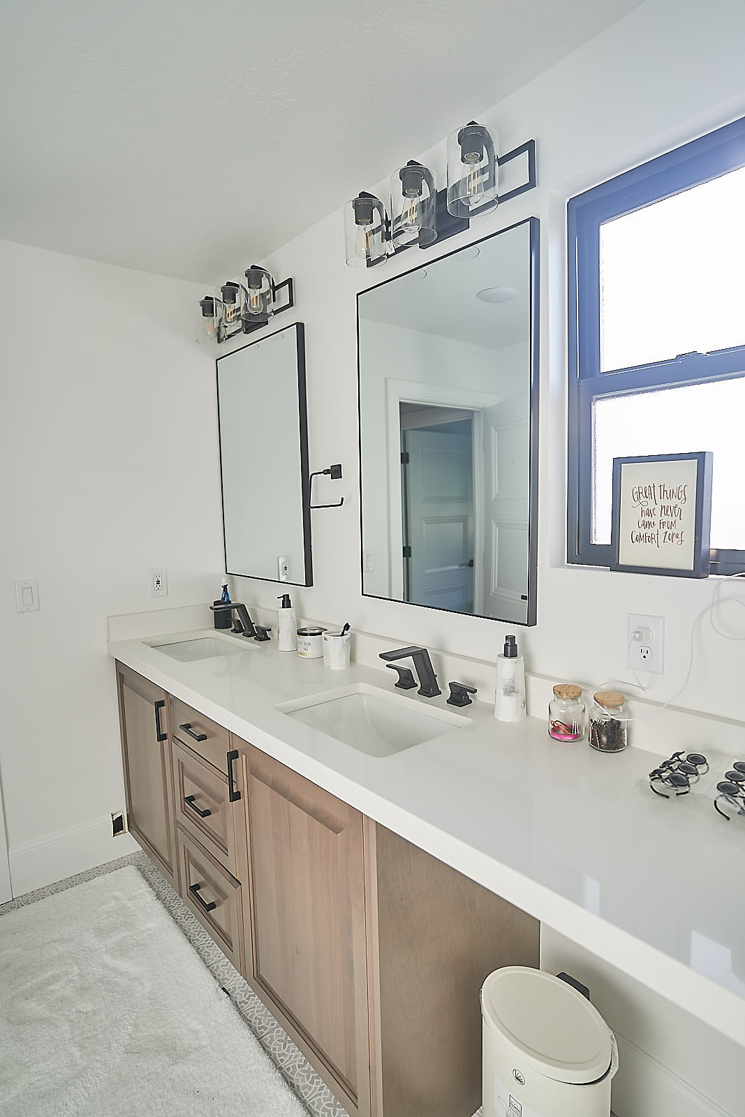 South Jordan project: Master bathroom double vanity with wood cabinetry and contemporary black fixtures (Photo 26/29)