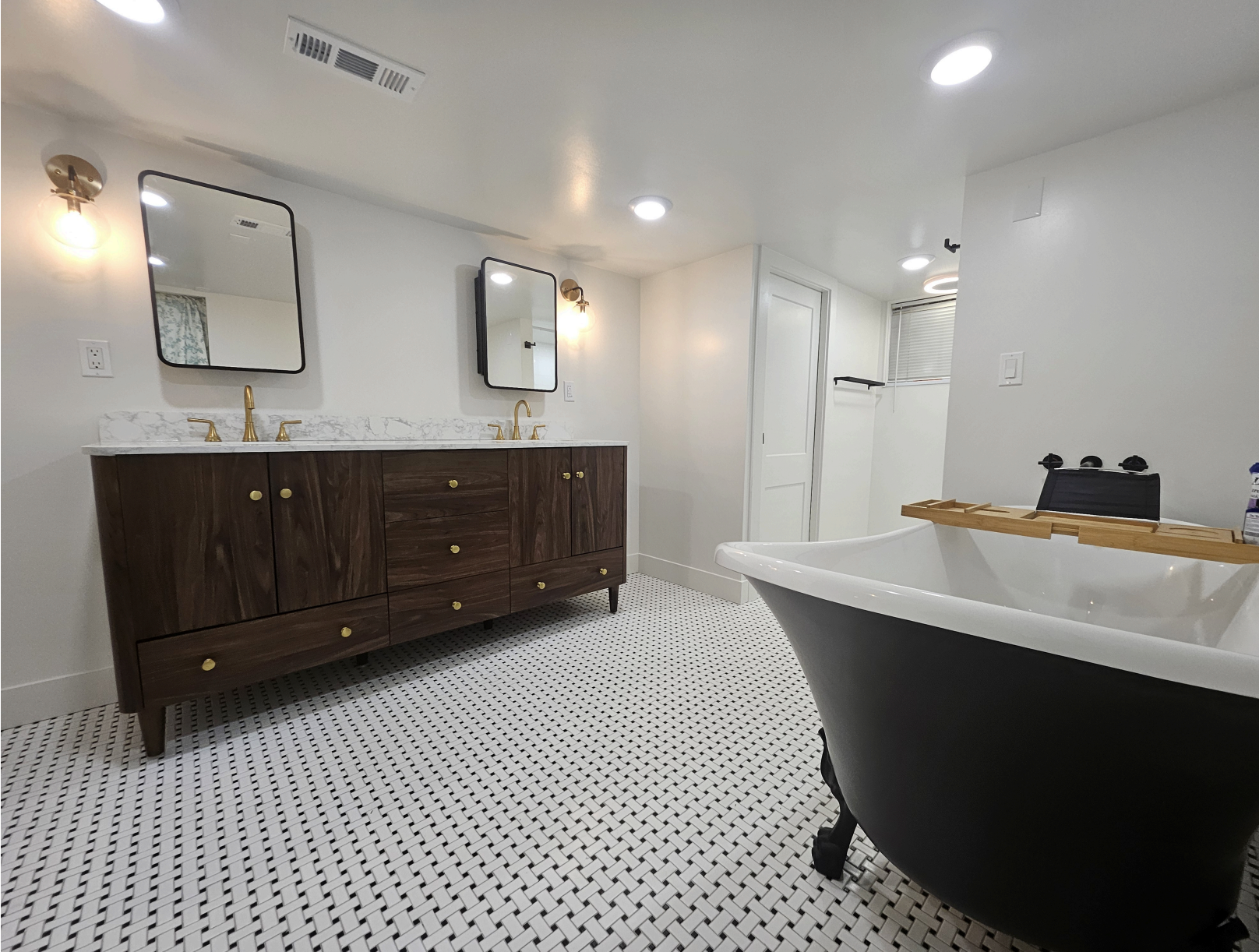 Basement project: Completed master bathroom, black clawfoot tub and patterned tile (Photo 3/12)